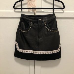 Understated Leather studded mini skirt size XS